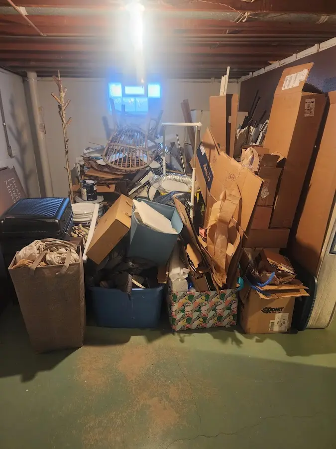 Roll-off dumpster container at job site for Construction Dumpster Rental in Manchester